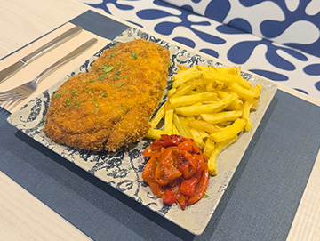 Cachopo asturiano con patatas fritas